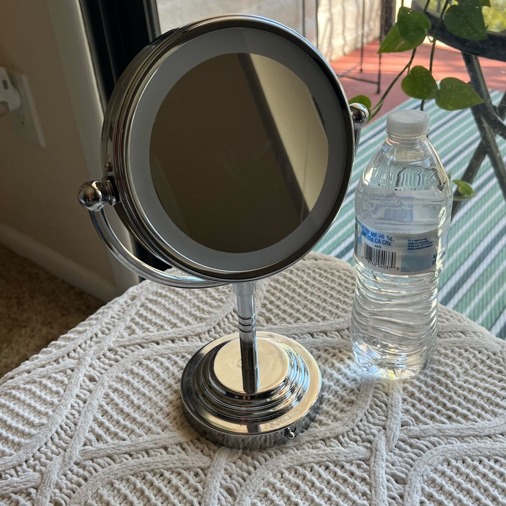 CONAIR double sided mirror with light .